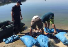 DOI BARBATI PRINSI LA PESCUIT COMERCIAL, CU 15 KG DE PESTE